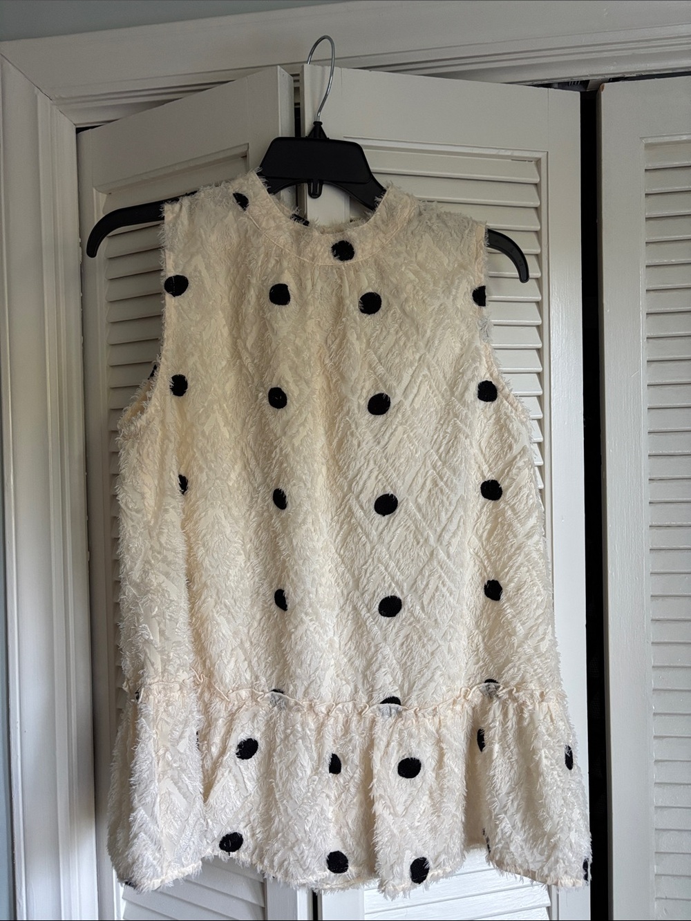 Joy Joy Cream Sleeveless blouse with Black Polka Dots